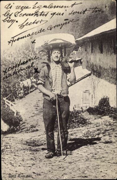 Ak Schweiz, Schweizer Senner trägt Käselaib