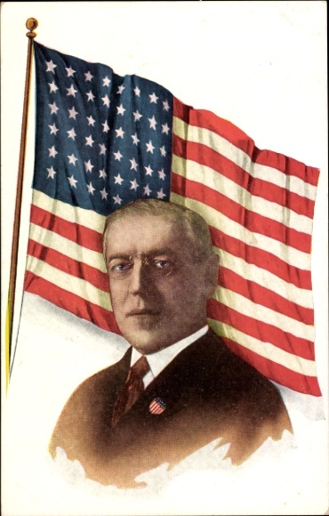Ak Präsident Roosevelt, Portrait vor Flagge