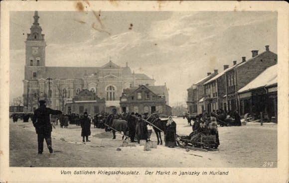 Ak Janiszky Kurland Lettland, Kriegsschauplatz 1. WK, Marktplatz, Schnee, Schlittengespann
