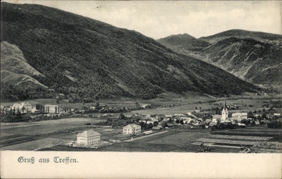 Ak Treffen am Ossiacher See Kärnten, Berglandschaft, Dorfansicht, Kirche, Felder, Gruß aus Treffe