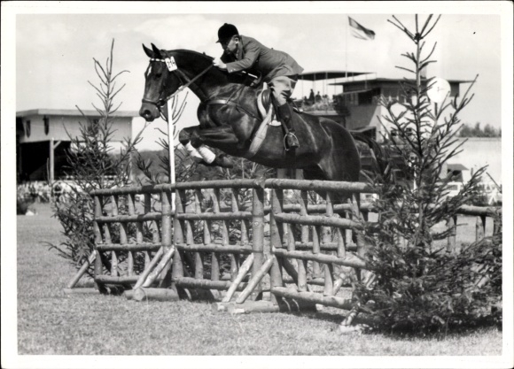 Foto Springreiten, Sprung über ein Hindernis, Pferd