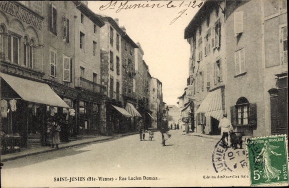 Ak Saint Junien Haute Vienne, Rue Lucien Dumas, Straßenpartie, Geschäfte