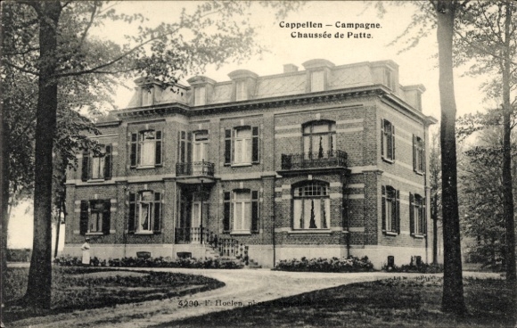 Ak Cappellen Kapellen Flandern Antwerpen, Haus, Bäume, Straße, Text auf Rückseite