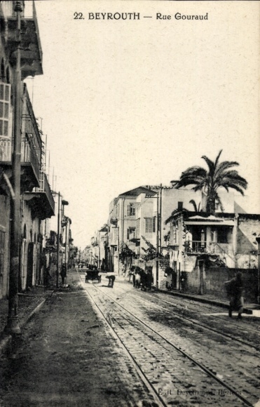 Ak Beirut Beyrouth Libanon, 22. BEYROUTH, Rue Gouraud, Straße mit Palmen, Häusern, Straßenbahn-Sc