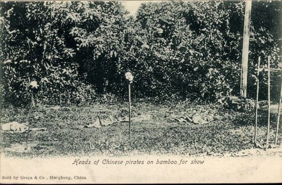 Ak China, Köpfe von chinesischen Piraten auf Bambus aufgespießt