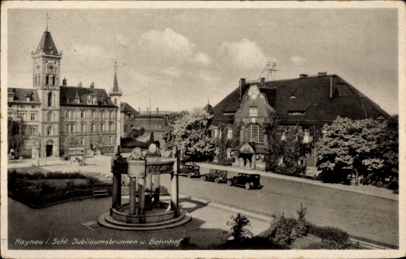 Ak Chojnów Haynau Schlesien, Jubiläumsbrunnen, Bahnhof,  Autos, Haynau