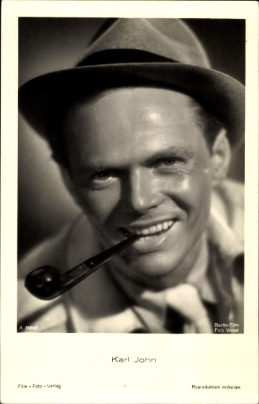 Ak Schauspieler Karl John, Portrait, Pfeife, Hut