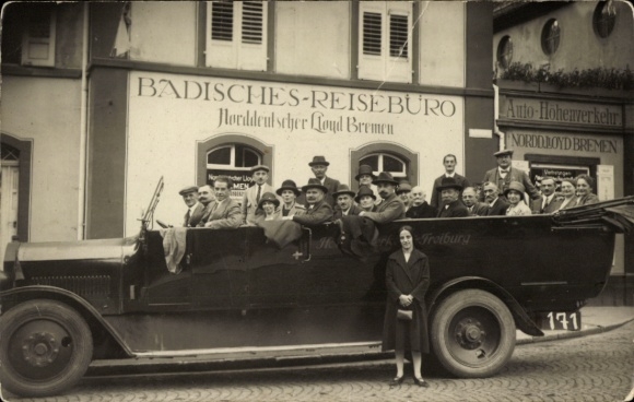 Foto Ak Freiburg im Breisgau, Rundfahrt-Auto, Fahrgäste, Badisches Reisebüro NDL Bremen