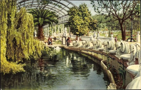 Ak Valencia Stadt Spanien, Gartenlandschaft, Teich, Palmen, Bäume, Menschen, Brücke